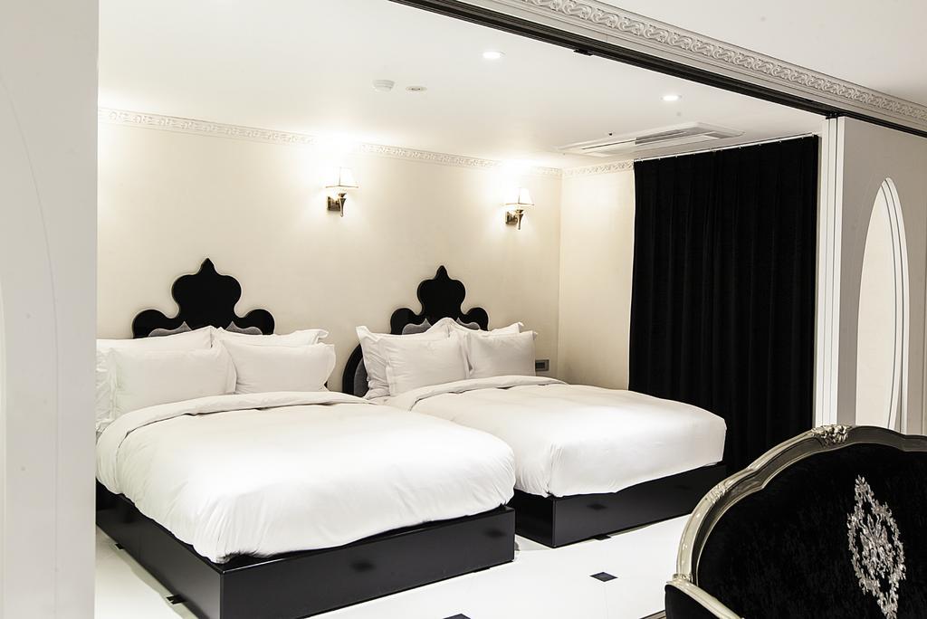 Richwell Hotel Сеул Стая снимка